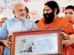 baba ramdev praises narendra modi as they share stage in haridwar